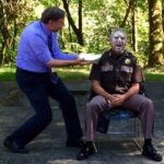 Cliff Moore Slams a pie in the sheriff’s face