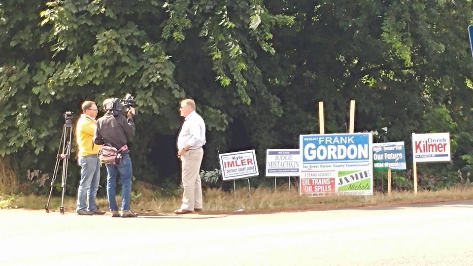 Kiro7 news interviewing candidate Randy Ross about his signs being taken by incumbent Commissioner Frank Gordon