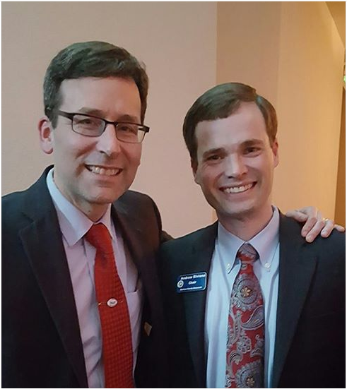 Former Spokane County Democratic Chair Andrew Biviano (right) and AG Bob Ferguson after AG starts "investigation" last year 